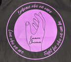 Zoomed in view of the back of a black t-shirt with a purple graphic design featuring the outline of a hand and text.