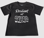 The front of a black t-shirt with white 'Resilient but Tired' graphic design on a gray background.